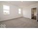 Bright carpeted bedroom with two large windows at 2254 Oakmont Dr, Plainfield, IN 46168