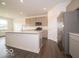 Modern kitchen featuring an island, stainless steel appliances, and bright countertops at 2254 Oakmont Dr, Plainfield, IN 46168