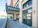 Prewitt Restaurant boasts a vintage illuminated sign, a convenient entrance, and charming architectural details at 2254 Oakmont Dr, Plainfield, IN 46168