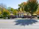 Oasis restaurant showcases retro architecture, outdoor patio seating, and vibrant landscaping for a cheerful ambiance at 2254 Oakmont Dr, Plainfield, IN 46168