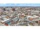 Extensive aerial view of an urban apartment building surrounded by various architectural styles and city infrastructure at 230 E 9Th St # Apt 405, Indianapolis, IN 46204