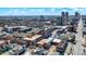 Overhead view of a brick apartment building in a dense urban setting with parking at 230 E 9Th St # Apt 405, Indianapolis, IN 46204