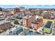 A classic brick building in a vibrant urban setting, surrounded by colorful homes and lush green spaces at 230 E 9Th St # Apt 405, Indianapolis, IN 46204