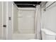 Standard bathtub and shower featuring a white shower curtain at 230 E 9Th St # Apt 405, Indianapolis, IN 46204