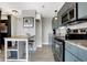 Apartment kitchen with stainless steel appliances and granite countertops and modern decor at 230 E 9Th St # Apt 405, Indianapolis, IN 46204