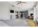 Bright open concept living space with modern kitchen, workspace, and a comfortable living area at 230 E 9Th St # Apt 405, Indianapolis, IN 46204