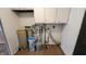 Utility Room with paint and water equipment, with access to other rooms at 2317 Courtney Rd, Indianapolis, IN 46219