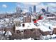 View of building roof with snowy downtown city skyline at 233 E St Joseph St # 3H, Indianapolis, IN 46202