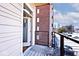 Balcony with wood decking and glass railings, showcasing city views at 233 E St Joseph St # 3H, Indianapolis, IN 46202