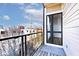 Balcony featuring glass railings and views of the neighborhood at 233 E St Joseph St # 3H, Indianapolis, IN 46202