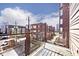 Balcony view overlooking neighboring buildings and city skyline at 233 E St Joseph St # 3H, Indianapolis, IN 46202
