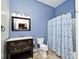 Bathroom with modern vanity, toilet, and tiled floors at 233 E St Joseph St # 3H, Indianapolis, IN 46202