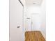Entry hall with wood floors and white painted walls and doors at 233 E St Joseph St # 3H, Indianapolis, IN 46202