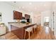 Bright, open kitchen featuring a kitchen island with bar stool seating at 233 E St Joseph St # 3H, Indianapolis, IN 46202