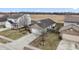 Aerial view of a well-maintained home with a driveway and lawn at 294 Bent Stream Ln, Brownsburg, IN 46112