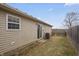 This backyard features an easy-access sliding door and an air conditioning unit at 294 Bent Stream Ln, Brownsburg, IN 46112
