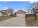 Charming brick home with a two-car garage and concrete driveway at 294 Bent Stream Ln, Brownsburg, IN 46112