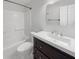 Clean bathroom featuring a modern vanity, framed mirror, and shower-tub combination at 3025 E 6Th St, Anderson, IN 46012