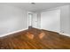 Cozy bedroom with natural wood floors, closet, and large window for great natural light at 3025 E 6Th St, Anderson, IN 46012
