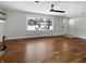 Bright living room featuring hardwood floors, recessed lights and a large window for natural light at 3025 E 6Th St, Anderson, IN 46012