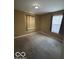 Bedroom with neutral walls, carpet and natural light at 3302 E 42Nd St, Indianapolis, IN 46205