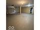 Large garage space with ample room for parking and storage and featuring a double door at 3302 E 42Nd St, Indianapolis, IN 46205