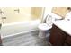 Bathroom with tub, toilet, and vanity at 3534 Country Walk Dr, Indianapolis, IN 46227