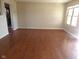 Living room with hardwood floors and natural light at 3534 Country Walk Dr, Indianapolis, IN 46227