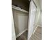 Spacious closet with sliding door and shelving for organized storage at 3561 Bowen Pl, Indianapolis, IN 46221
