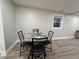 Cozy dining room with table for four, modern furnishings, and bright natural light at 3561 Bowen Pl, Indianapolis, IN 46221