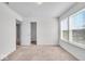 Bright bedroom with plenty of light featuring carpet and neutral paint at 3602 Shepperton Blvd, Indianapolis, IN 46228