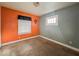 Bedroom with a window, hardwood floors, and two-tone walls at 3610 Robson St, Indianapolis, IN 46201