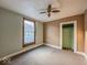 Empty bedroom featuring neutral colored walls, a window and ceiling fan at 3610 Robson St, Indianapolis, IN 46201