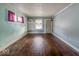 Bedroom featuring hardwood floors, natural light, and a neutral color scheme at 3610 Robson St, Indianapolis, IN 46201