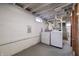 Basement laundry area features a washer and dryer, painted walls, and concrete floors at 4035 N Kenwood Ave, Indianapolis, IN 46208