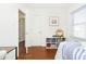 Bright bedroom features wood-look floors, ample storage, and modern decor at 4035 N Kenwood Ave, Indianapolis, IN 46208