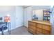 Neutral bedroom featuring a desk, chair and bookshelf at 4113 Gambel Rd, Indianapolis, IN 46221