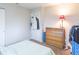 Clean, neutral bedroom featuring a dresser and closet at 4113 Gambel Rd, Indianapolis, IN 46221