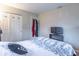 Cozy bedroom with a double closet and a television at 4113 Gambel Rd, Indianapolis, IN 46221