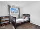Cozy bedroom with neutral walls, plush carpet and a window with natural light at 4307 Dahlia Ct, Indianapolis, IN 46220