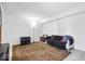 A tidy living room showing neutral decor and a large area rug at 4307 Dahlia Ct, Indianapolis, IN 46220