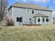 Spacious backyard with a deck and blue siding house at 4309 Worchester Ct, Carmel, IN 46033