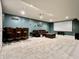 Finished basement entertainment space features a bar area and a large projector screen at 4309 Worchester Ct, Carmel, IN 46033