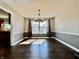 Dining room with hardwood floors and chandelier at 4309 Worchester Ct, Carmel, IN 46033