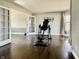 Spacious living room with hardwood floors and french doors at 4309 Worchester Ct, Carmel, IN 46033