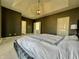 Large main bedroom with a vaulted ceiling, ensuite bath, and plush gray carpeting at 4309 Worchester Ct, Carmel, IN 46033