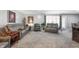 Open-concept living room featuring comfortable seating, neutral tones, and ample space at 4501 N Wheeling Ave # 6A - 201, Muncie, IN 47304