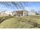 Large backyard featuring a patio and lush lawn, ideal for outdoor activities and gatherings at 481 Autumn Springs Ct, Avon, IN 46123