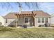 Backyard with a pergola that offers an outdoor seating area perfect for relaxing or entertaining guests at 481 Autumn Springs Ct, Avon, IN 46123
