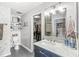 Stylish bathroom featuring a marble countertop, modern fixtures, and a view into the walk-in closet at 481 Autumn Springs Ct, Avon, IN 46123